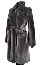 Load image into Gallery viewer, A grey sheepskin trench coat with fur hooks fastening and a tie, featuring a classical collar and front pockets.