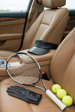 Load image into Gallery viewer, A black leather sports cap and gloves, with the cap having a snapelis logo and the gloves featuring a wrist strap.