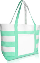 Load image into Gallery viewer, A white cotton canvas handbag with green stripes, featuring a solid pattern and a zipper closure.