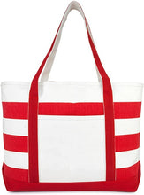 Load image into Gallery viewer, A bicolor (red and white) cotton canvas handbag with straps and a zipper closure.