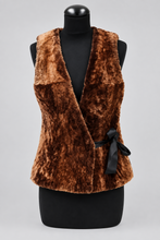 Load image into Gallery viewer, A dark brown sheepskin fur vest with goldening tipping, displayed on a mannequin.