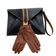 Load image into Gallery viewer, Black clutch bag with brown strap and matching gloves on a white background