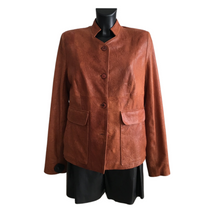 Load image into Gallery viewer, A brown, camel-colored leather jacket with a collar, buttons, and pockets, displayed on a mannequin.