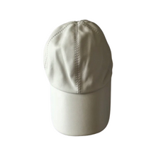 Load image into Gallery viewer, A white leather sports cap with a snap shape, adjustable head width, and decorative seams.