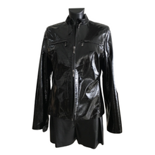 Load image into Gallery viewer, A black short patent leather jacket with a stand collar, zipper opening, and lining, displayed on a mannequin.