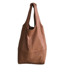 Load image into Gallery viewer, A cognac brown leather handbag with a zipper closure pocket inside and two wide shoulder straps, ostrich pattern leather.