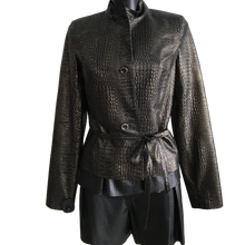 Load image into Gallery viewer, A black belted short leather jacket with a crocodile pattern and a golden finish, displayed on a mannequin.