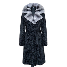 Load image into Gallery viewer, Black astrakhan fur knee-length coat with a chinchilla collar and a tie at the waist, displayed on a mannequin.