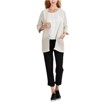 Load image into Gallery viewer, A woman wearing a beige linen cardigan with 3/4 sleeves, paired with black pants and black shoes.