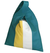 Load image into Gallery viewer, A tricolor handbag in blue, white, and yellow with a soft Nappa sheep leather lining and a zippered small inner pocket.