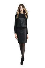 Load image into Gallery viewer, Woman wearing a black leather outfit on a white background
