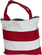 Load image into Gallery viewer, A white and red striped leather shopping bag with a solid pattern and two red handles.