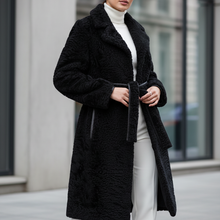 Įkelti nuotrauką į galerijos peržiūros programą, Vilniaus Kailiai Mod. 02048XXX coat in black, featuring a tailored fit with a high collar and button closure, on a hanger.
