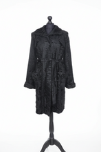 Įkelti nuotrauką į galerijos peržiūros programą, A black textured coat displayed on a black mannequin against a plain white studio background.
