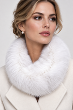 Load image into Gallery viewer, A close-up of a woman wearing a plush white faux fur cowl neck warmer over a cream-colored coat, with a pearl earring visible.
