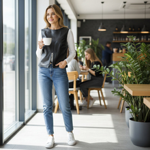 Load image into Gallery viewer, Woman holding a coffee cup in a modern cafe setting
