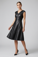 Load image into Gallery viewer, Vilniaus Kailiai Mod. 09821xxx dress featuring elegant fabric and stylish design, shown on a model in a fashion photoshoot.

