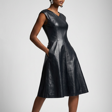 Load image into Gallery viewer, Vilniaus Kailiai Mod. 09821xxx dress in soft fabric, shown with intricate detailing and elegant design on a model.
