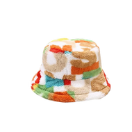 A colourful artificial fur  bucket hat on plain background.