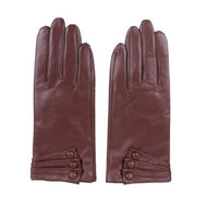 A pair of brown leather gloves with a solid pattern, designed for women.