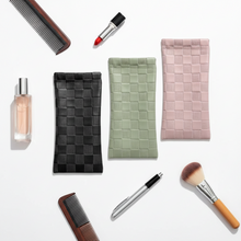 Load image into Gallery viewer, Vilniaus Kailiai eyewear case in black with textured surface, designed to protect glasses and store accessories.
