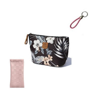 A black floral-patterned PU leather squeeze case for glasses with a colorful leather key holder and a pink textile cosmetic bag, plus a pink floral-patterned textile with a key holder.