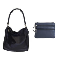 A black faux leather handbag with a tassel detail, alongside a blue faux leather key holder.