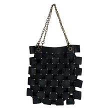 Load image into Gallery viewer, Black woven handbag with chain strap on a white background

