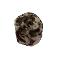 A sheepskin fur cap with a light and dark brown color pattern.