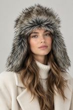 Įkelti nuotrauką į galerijos peržiūros programą, Black leather hat with faux fur lining, unisex Vilniaus Kailiai fashion accessory, featuring a rounded brim and cozy interior.
