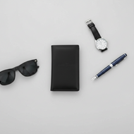 Vilniaus Kailiai Mod. W-1 wallet with multiple card slots and a sleek black leather finish, designed for style and functionality.