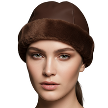 Load image into Gallery viewer, Brown fur hat worn by a model on a gray background
