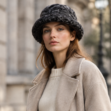 Load image into Gallery viewer, Vilniaus Kailiai Mod. K02629XX stylish hat worn by woman, featuring elegant design and warm material for fashion and comfort.
