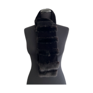 A black velour and mink fur scarf displayed on a mannequin torso against a white background.
