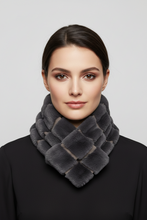 Įkelti nuotrauką į galerijos peržiūros programą, A woman wearing a dark gray woven faux-fur cowl neck warmer, styled with a black top against a solid light gray background.
