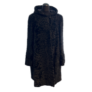 Hooded long astrakhan fur coat with hidden pockets on sides, loose style