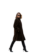 Įkelti nuotrauką į galerijos peržiūros programą, Vilniaus Kailiai Mod. 02291xx coat in dark fabric, showing the front view with a collar and button closure.

