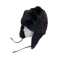 A black fur hat with a visor, made of rabbit fur, displayed on a mannequin head.