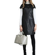 Įkelti nuotrauką į galerijos peržiūros programą, Vilniaus Kailiai Mod. 09765xxx dress in a stylish design, shown on a model with a focus on the fabric and fit.
