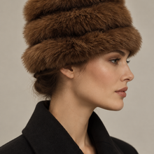 Įkelti nuotrauką į galerijos peržiūros programą, Vilniaus Kailiai Mod. K05724XX hat, stylish winter hat with knit texture and pom-pom, in neutral color for cold weather.
