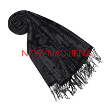 Load image into Gallery viewer, Black scarf with fringe on a black background featuring &#39;NEW/NAUJIENA&#39; text.
