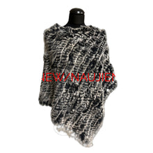 Load image into Gallery viewer, Knitted shawl on a mannequin with &#39;NEW/NAUJIENA&#39; text in red on a black background
