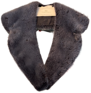 A deep burgundy mink collar with a lining and fur hook fastening at the front, displayed on a mannequin.