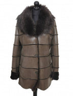 A khaki brown sheepskin fur long coat with a shawl collar and front pockets, displayed on a mannequin.