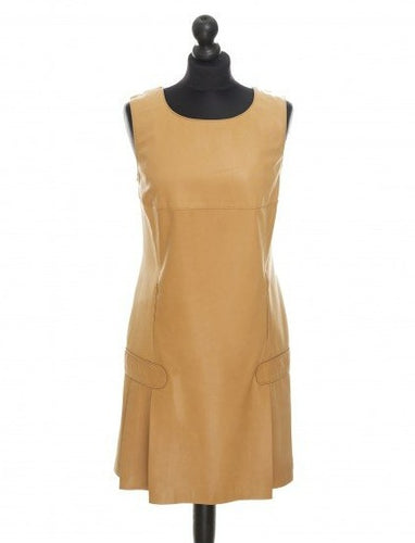 Camel color sleeveless midi length sheep leather dress with a round neckline and an invisible zipper at the back, displayed on a mannequin.