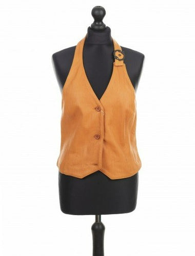 Orange sheep leather vest with a fitted silhouette, buttons at the front, and an adjustable stripe around the neck, displayed on a mannequin.