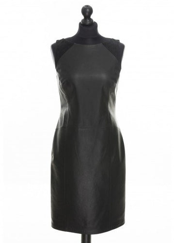 Black sleeveless leather dress with round neckline and suede details at the upper front, fitted silhouette, midi length.