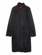 A dark chocolate brown long sheepskin fur coat with a regular collar and burgundy mink fur detailing on the cuffs. It features a loose fit and fur hooks fastening, with front pockets and a lining inside.