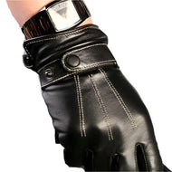 A close-up of a black leather glove with a buckle and a watch on the wrist, showcasing the quality and design of the glove.