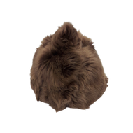 A brown sheepskin fur cap with a soft, plush design, featuring a lining and a velcro strap.